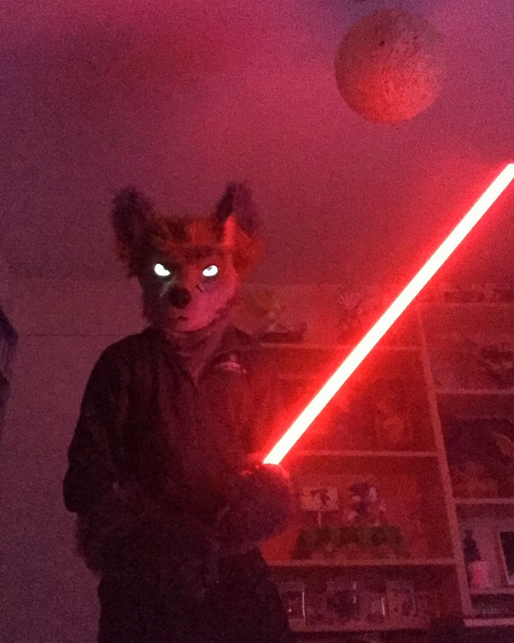 A Star Wars fan in a lightsaber cosplay