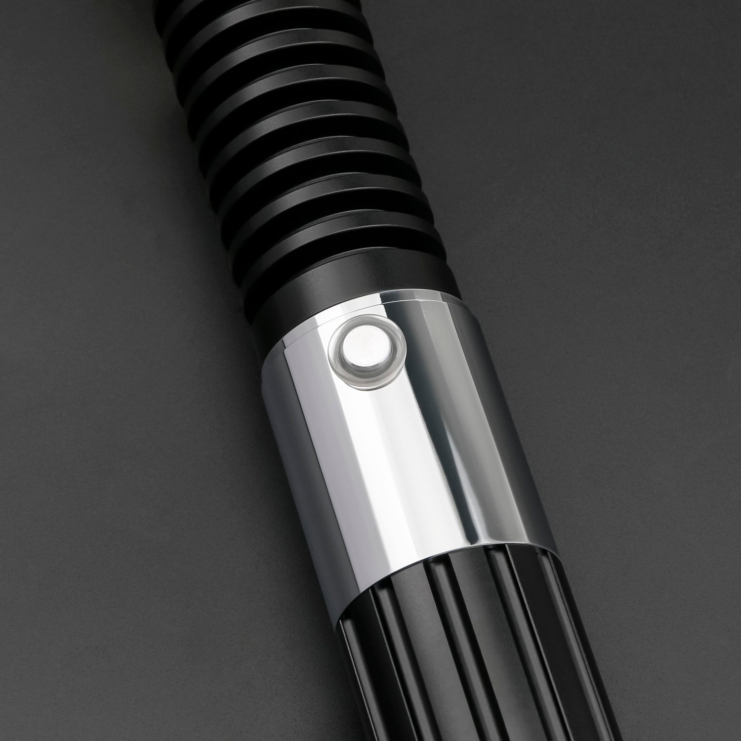 Obi-Wan SE lightsaber button