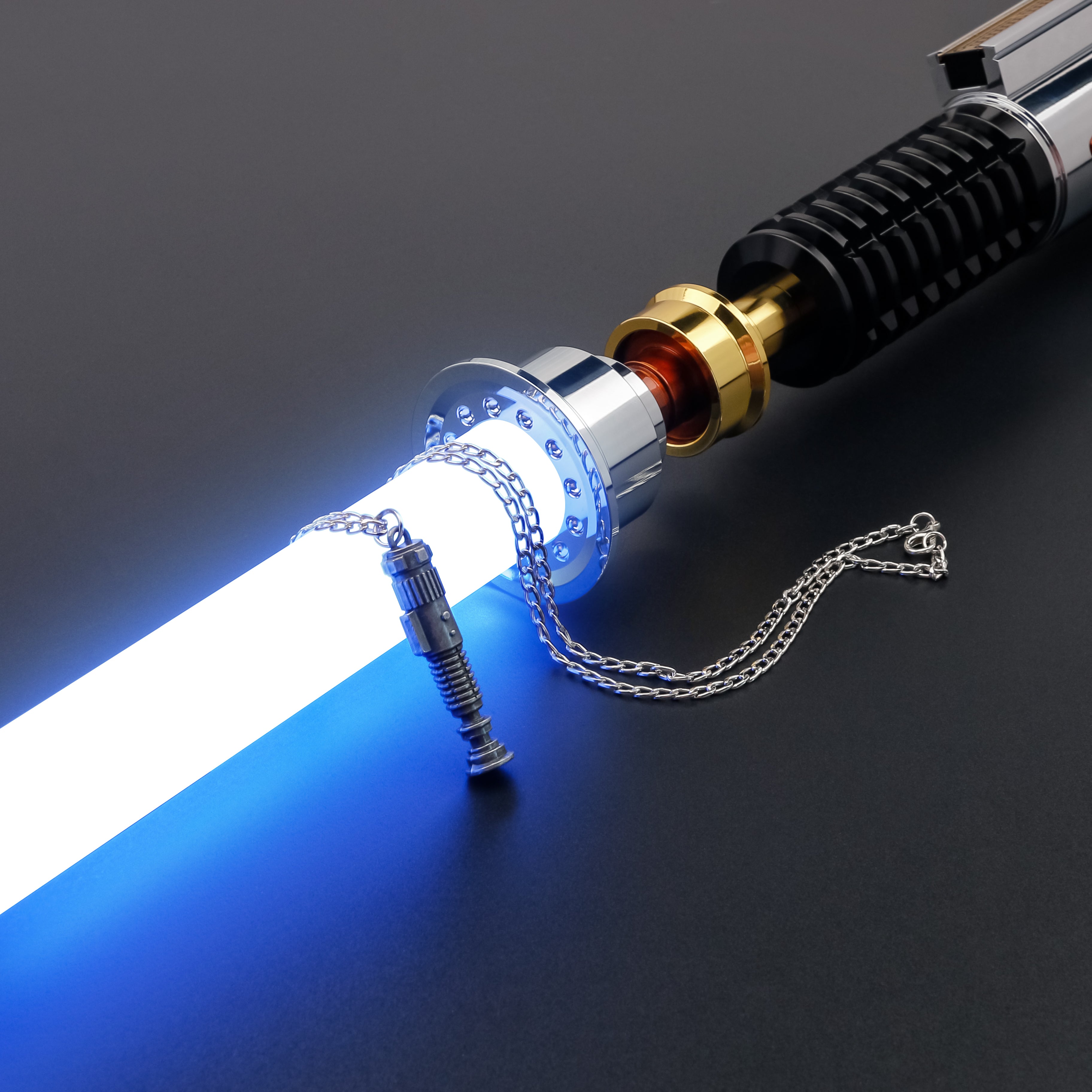 The necklace is wrapped around a lightsaber