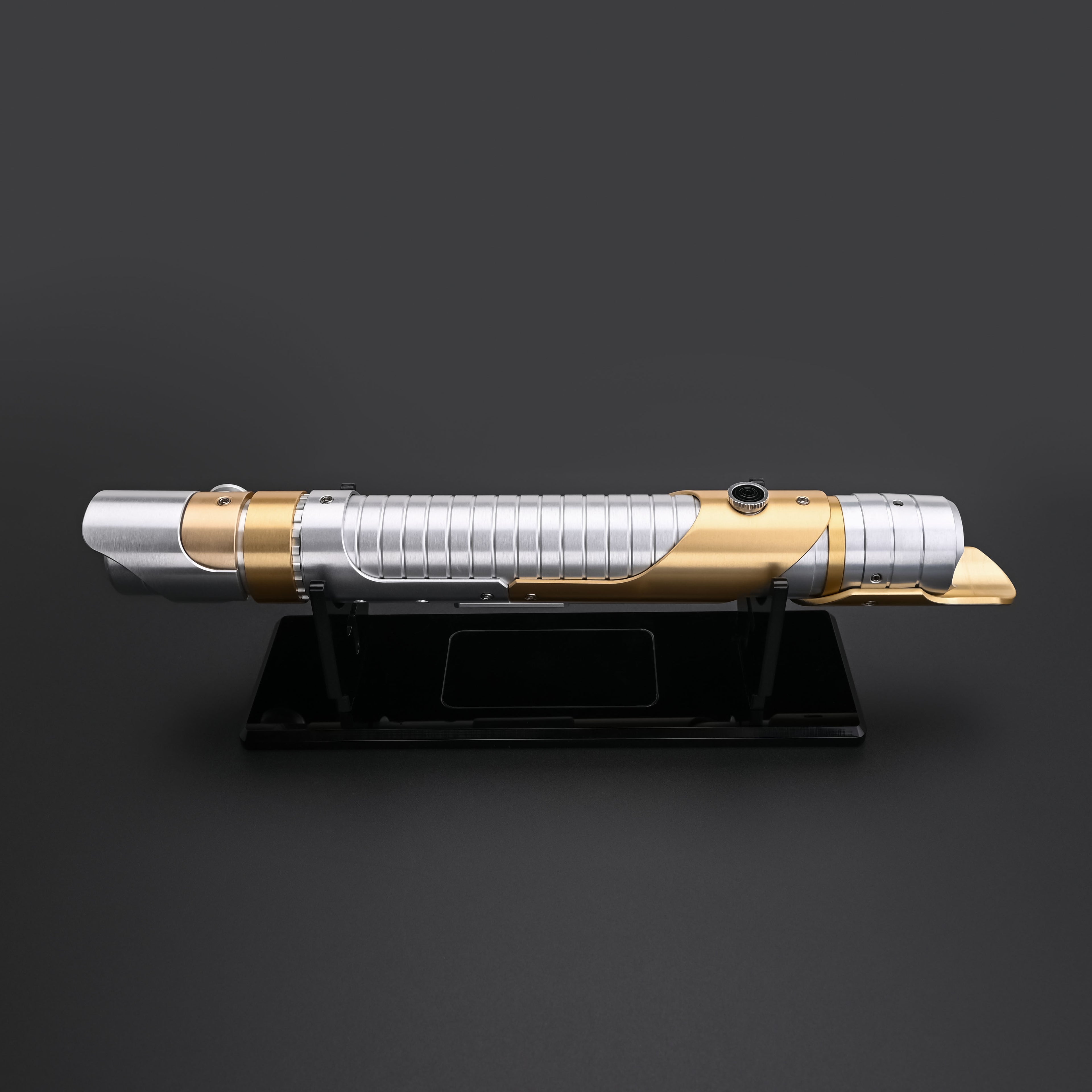 Skeleton Crew lightsaber hilt on a stand